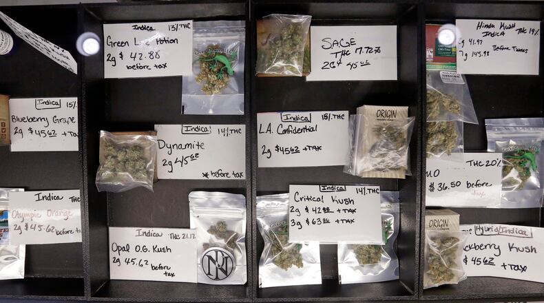 Packaged marijuana is displayed for sale at retail shop Cannabis City in Seattle. Sales of medical and recreational marijuana in the United States are expected to reach $5 billion or more in 2017. AP PHOTO