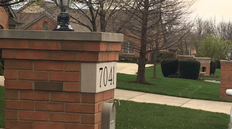 Many residents in Vienna Park, an all brick and stone subdivision in Miami Twp., fear allowing lesser development standards for a proposed 82-home development next to their neighborhood would hurt property values. NICK BLIZZARD/STAFF PHOTO
