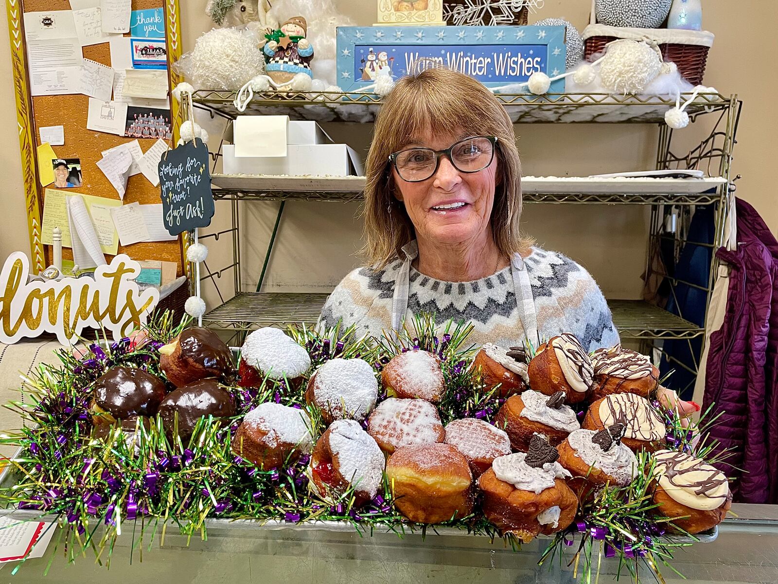 Ashley’s Pastry Shop, located at 21 Park Ave. in Oakwood, has a variety of paczki, pronounced “punch-key,” a Fat Tuesday treat that originated in Poland. Pictured is Theresa Hammond, owner of Ashley’s Pastry Shop.