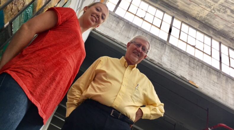 Krysten Smith, Front Street Buildings manager, and Chris Meyer, of Energy Optimizers USA, in an October 2017 photo. Energy Optimizers worked with the Dayton-Montgomery County Port Authority to update the Front Street properties’ boiler last year. THOMAS GNAU/STAFF