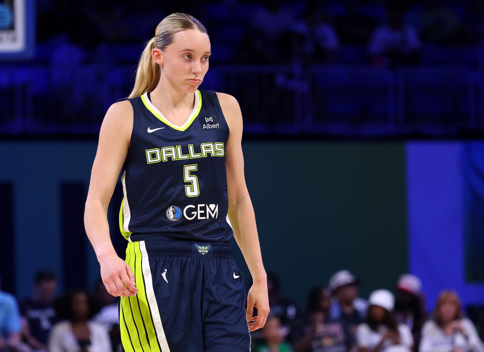 Dallas Wings guard Paige Bueckers (5) stands on the court during a Minnesota Lynx foul shot in a WNBA basketball game Friday, May 16, 2020, in Arlington, Texas. (AP Photo/Richard W. Rodriguez)