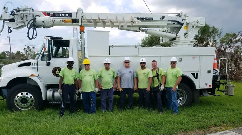 Seven Hamilton municipal lineworkers spent two weeks in Florida helping the city of Homestead reconnect its electrical system after Hurricane Irma. They were Joe Schlichter, Jeff Hill, Ed Kimbel, Willie Carter, Kelly McDonough, Chris Riddle and Lenny Zepp. CONTRIBUTED