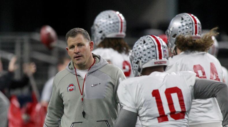 Ohio State’s Greg Schiano watches the team practice at AT&T Stadium on Tuesday, Dec. 26, 2017, in Arlington, Texas. David Jablonski/Staff