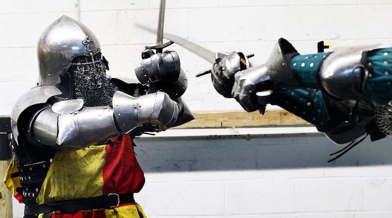 Cincinnati Barbarians Chris Milesky (left) and Jay Bishop (right) practice Thursday, Feb. 13, 2025 for the upcoming season at their new facility in Centerville. MARSHALL GORBY\STAFF