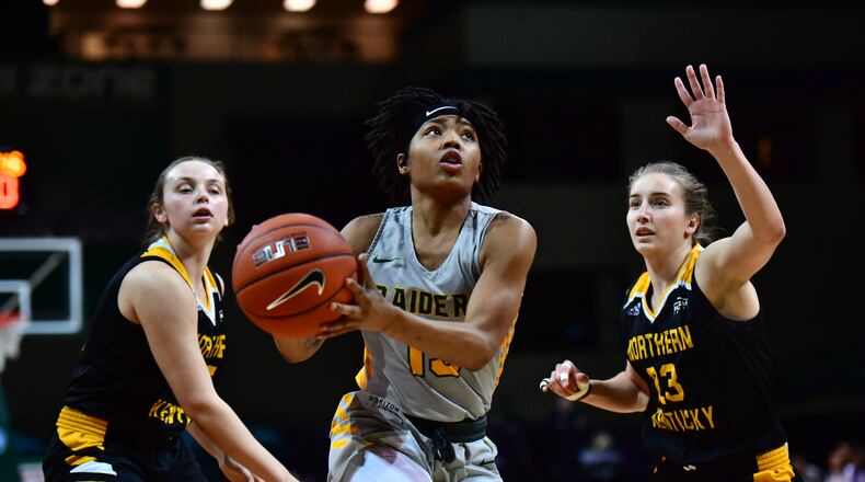 Wright State’s Angel Baker splits two NKU defenders during a game earlier this season at the Nutter Center. WSU Athletics photos