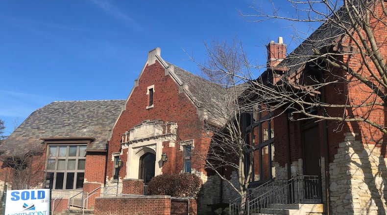 The former Dayton View library at 1515 Salem Ave. has sold. The buyer is interested in opening a pre-school and pediatric dental clinic. CORNELIUS FROLIK / STAFF