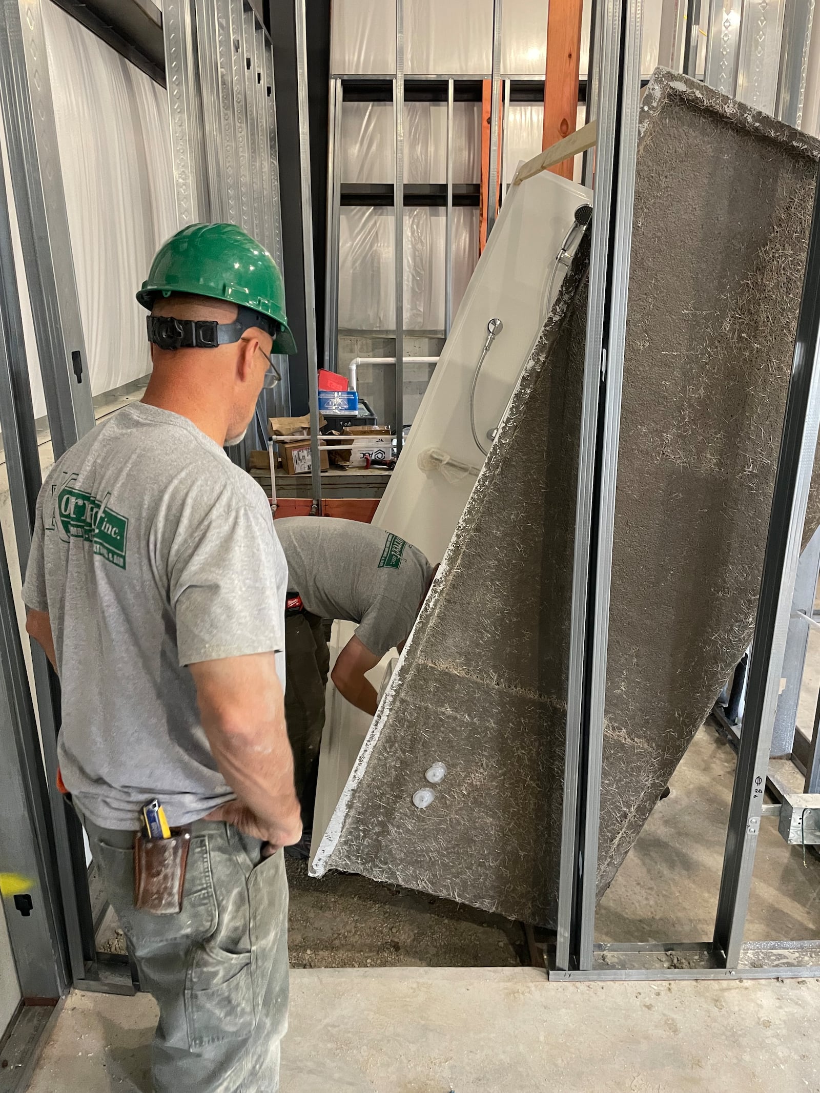 Plumbers with Konnect Inc. work on a bathroom fixture. Stretches of below-freezing temperatures result in increased calls for service to plumbing and heating professionals. PROVIDED