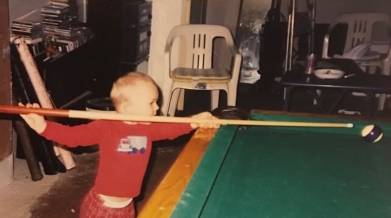 Three-year-old Billy Thorpe lines up a shot. CONTRIBUTED