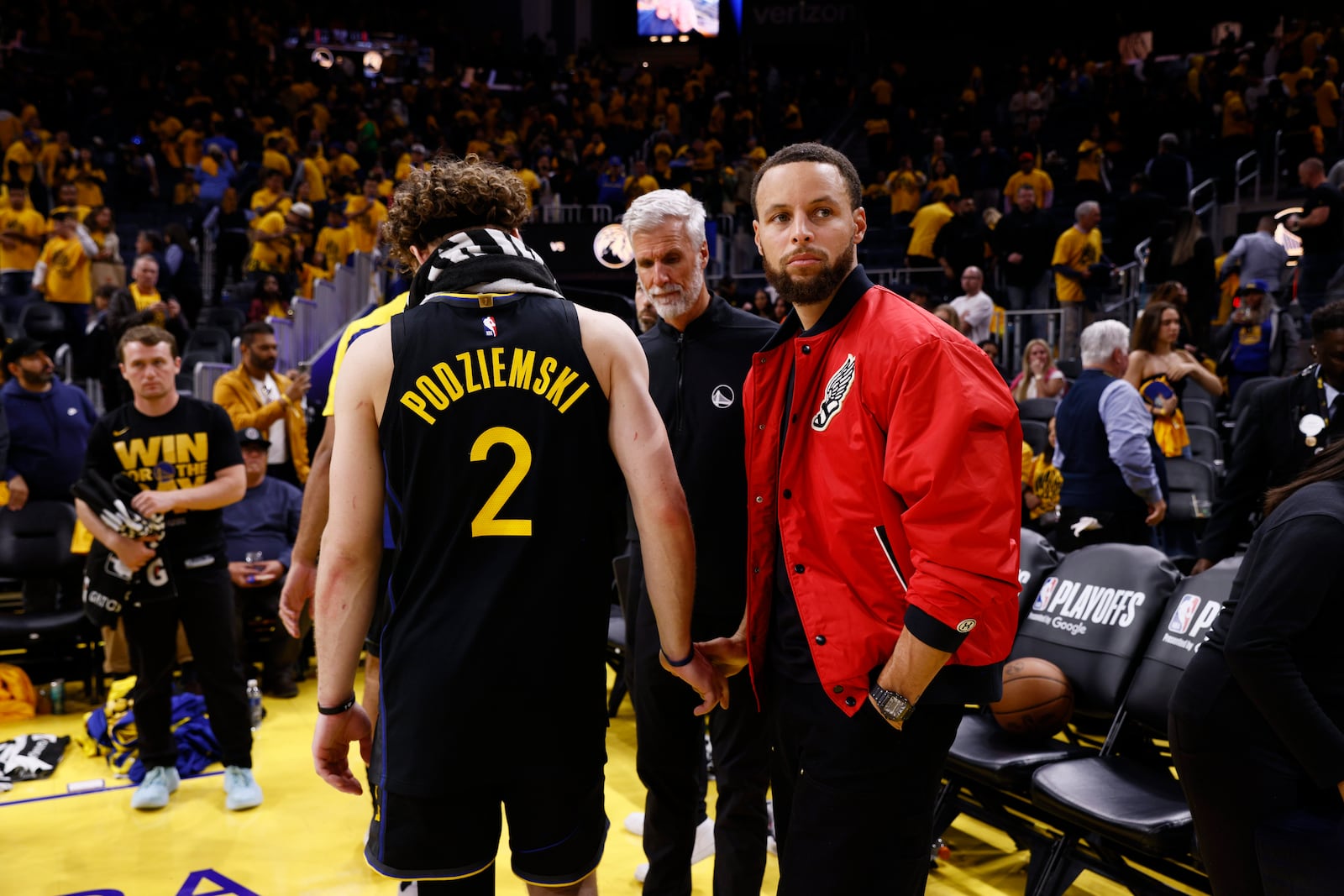 The Golden State Warriors' Stephen Curry acknowledges the Warriors as they exit following Game 4 of the NBA Playoffs Western Conference Semifinals at Chase Center in San Francisco, Monday, May 12, 2025. The Minnesota Timberwolves won 117-110 and lead the series 3-1. (Santiago Mejia/San Francisco Chronicle via AP)