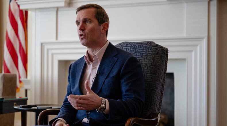 Kentucky Gov. Andy Beshear gives an interview, Monday, Jan. 12, 2026, in Frankfort, Ky. (AP Photo/Jon Cherry)