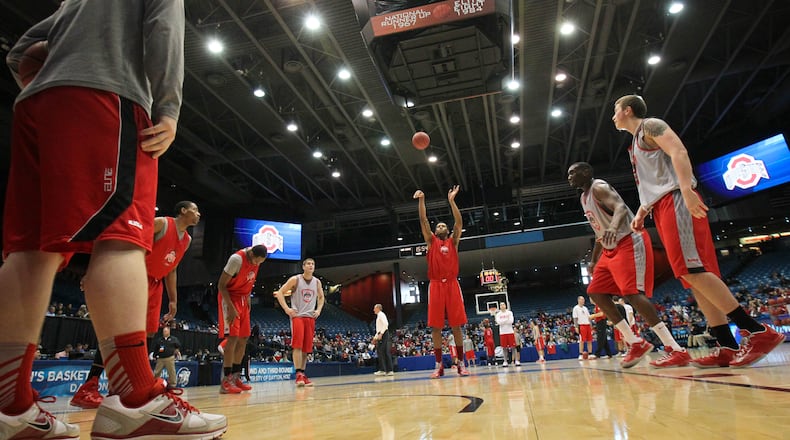 OSU basketball players take free throw shooting practice at UD Arena during practice Thursday. Ohio State will take the court for their second seeded NCAA Tournament game on Friday vs. Iona . JIM WITMER / STAFF