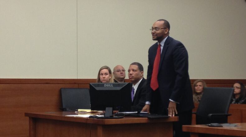 Dayton-area Rep. Clayton Luckie, seated, appeared in a Columbus courtroom on Thursday.