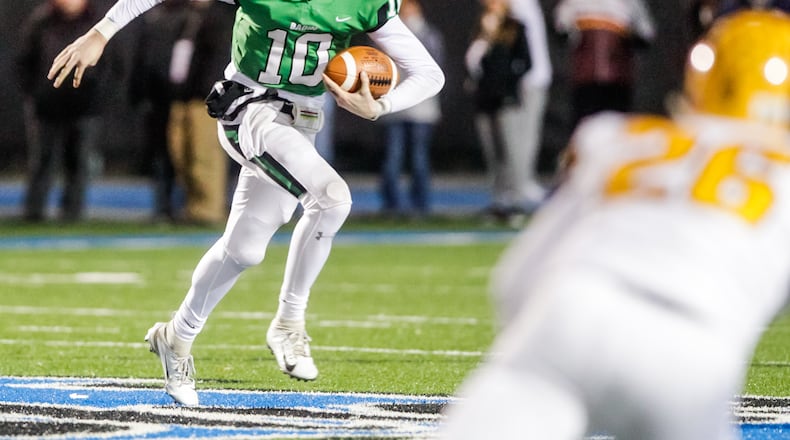 Badin’s Zach Switzer shown in action from earlier this season. Badin defeated Alter 38-21 Friday night in second-round playoff action. NICK GRAHAM/STAFF