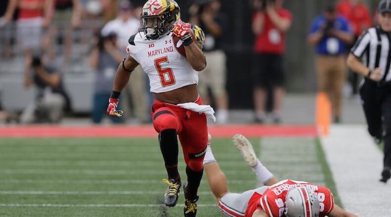 Maryland's Ty Johnson (6) returns a kickoff 65 yards for a touchdown past Ohio State kicker Sean Nuernberger (96) at Ohio Stadium in Columbus, Ohio, on October 7, 2017. (Jonathan Quilter/Columbus Dispatch/TNS)