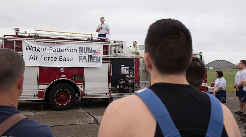 Col. Bradley McDonald, 88th Air Base Wing commander. speaks to runners during the Run for the Fallen at Wright-Patterson Air Force Base Sept. 9. The Run for the Fallen provides an opportunity to remember and honor those who lost their lives and recognize those who continue to defend the nation. (U.S. Air Force photo/Michelle Gigante)