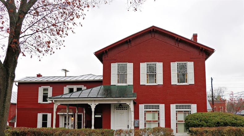The main house as part of the South Walnut Street property for sale has been divided into two separate residences but could easily be converted back into one. CONTRIBUTED