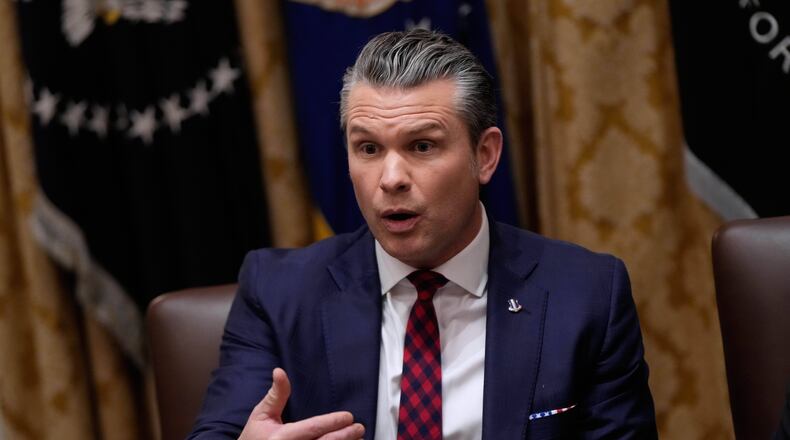 Defense Secretary Pete Hegseth speaks during a Cabinet meeting at the White House, Tuesday, Dec. 2, 2025, in Washington. (AP Photo/Julia Demaree Nikhinson)