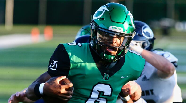 Northmont's Cahke' Cortner runs for a touchdown against Fairmont on Friday, Sept. 9, 2022, at Premier Health Stadium in Clayton. David Jablonski/Staff
