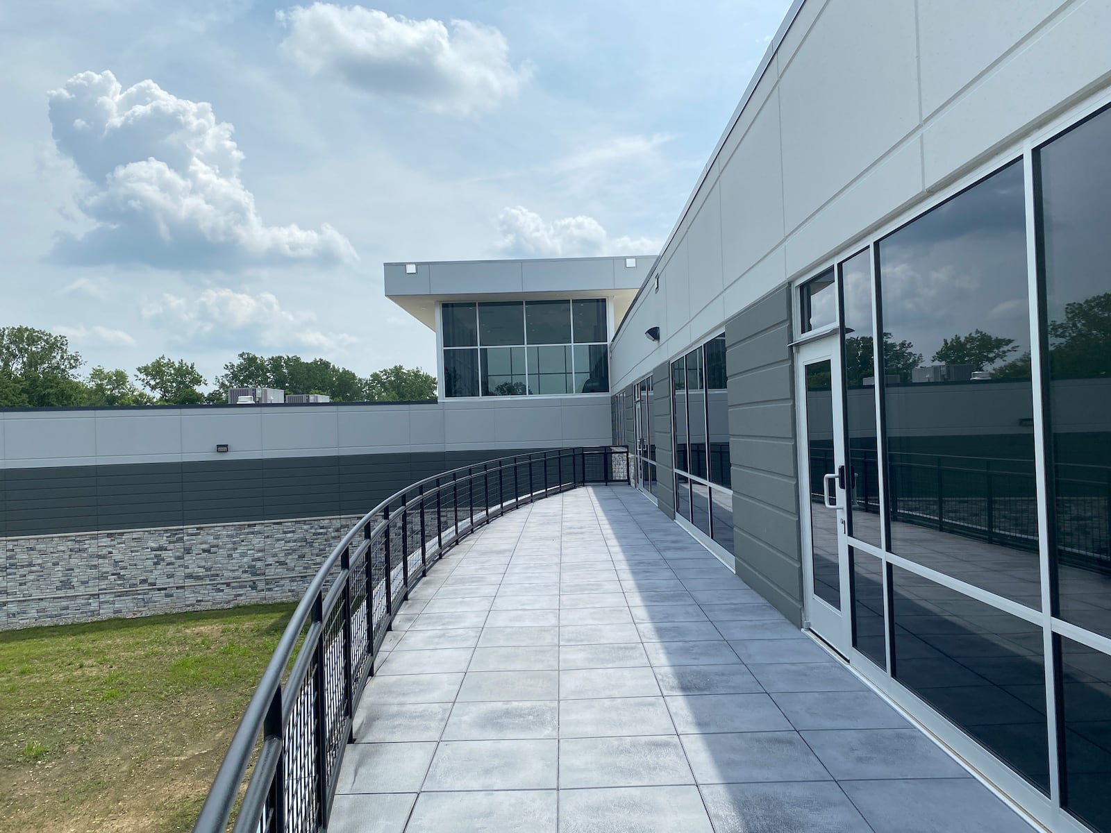 CRG Defense held a ribbon-cutting ceremony for its new 25,763-square-foot headquarters at 8789 Washington Church Road in Miami Twp. on Tuesday, July 15. The two-story facility includes 19,673 square feet of office space and 6,090 square feet of community space, designed to support collaboration and innovation. ERIC SCHWARTZBERG/STAFF