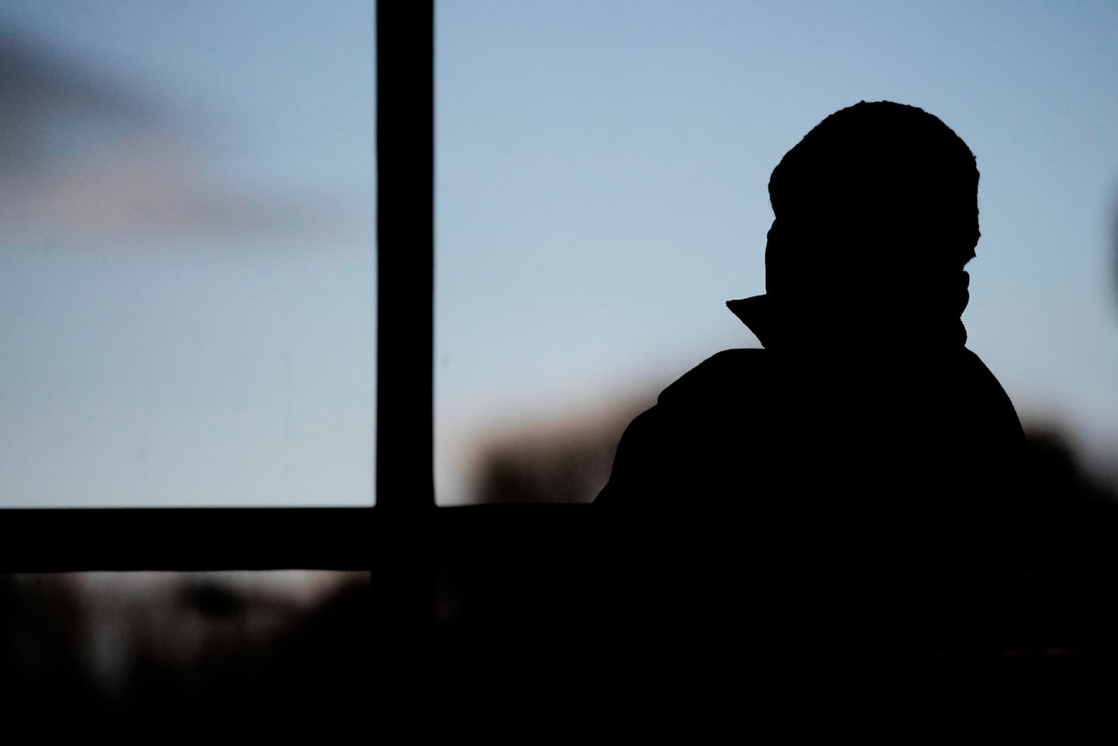 FILE - An audience member listens to a speaker during an Iowa Migrant Movement for Justice informational meeting, Wednesday, March 27, 2024, in Des Moines, Iowa. (AP Photo/Charlie Neibergall, File)