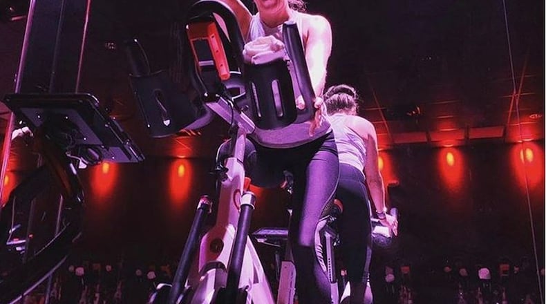 Julie Given at CycleBar at Austin Landing. While Cycle Bar was closed, many of the bikes from the indoor cycling studio were still getting use as they were rented out to members who could pedal along during Livestream classes. CONTRIBUTED