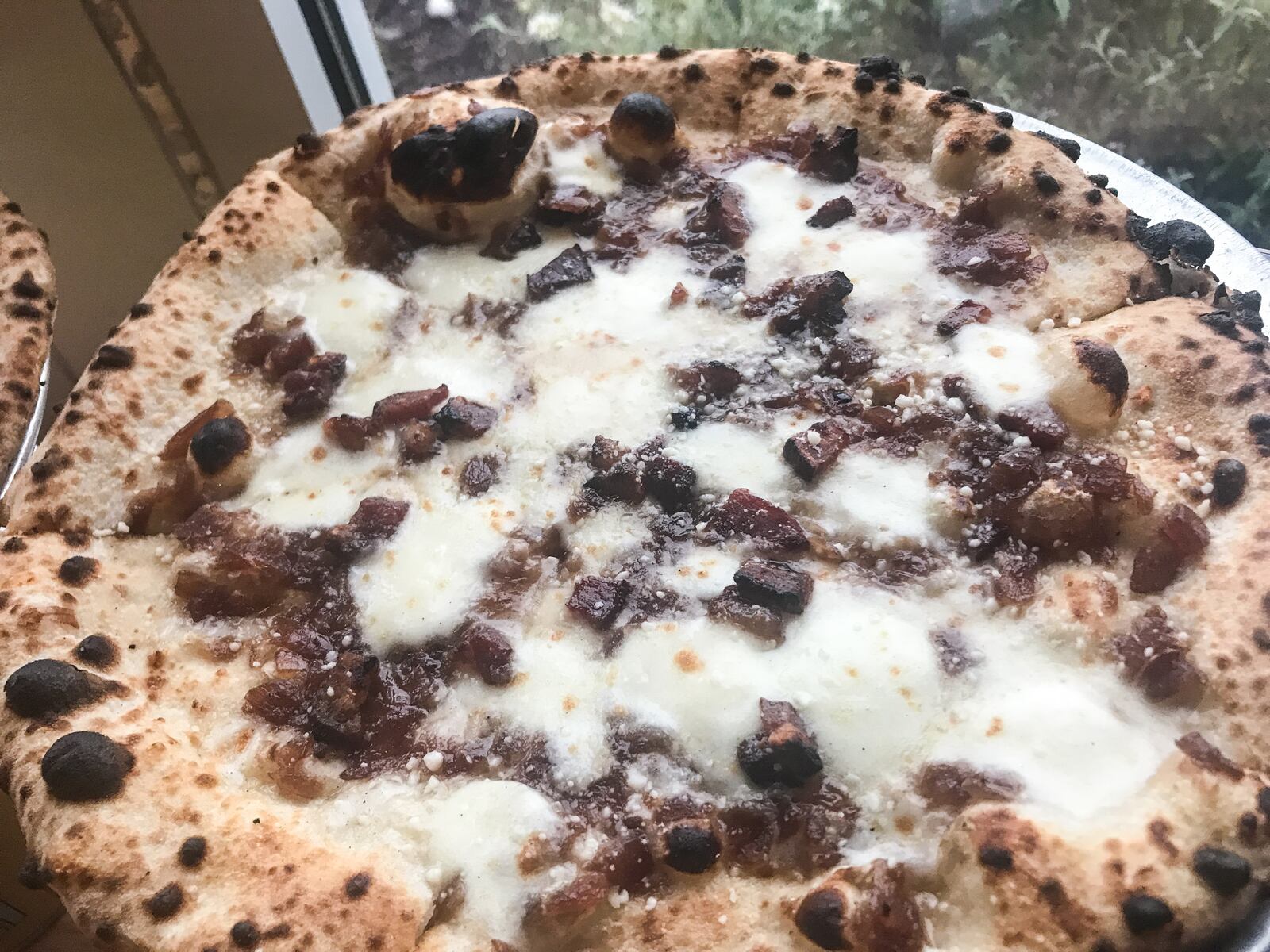 Old Scratch Pizza is offering free pizzas to guest who text "OSP" to 797979 on its first anniversary, Oct. 18, 2017