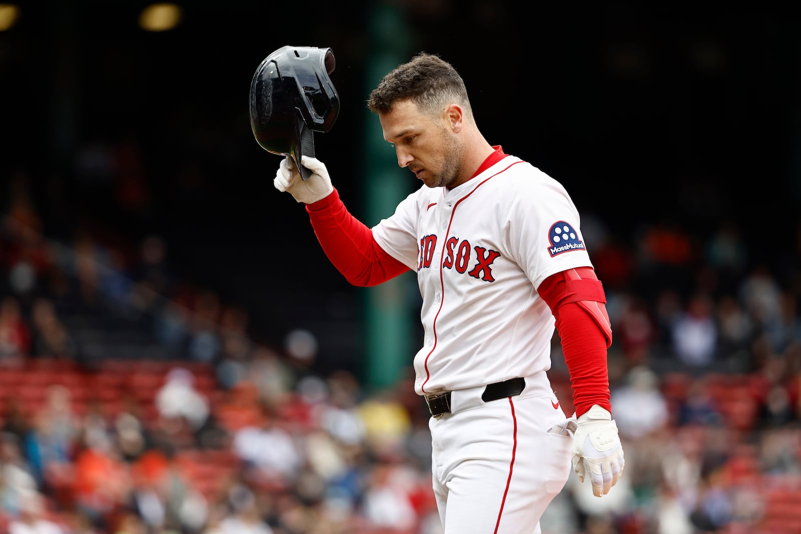 Boston Red Sox's Alex Bregman heads for the dugout after injuring himself on a single against the Baltimore Orioles during the fifth inning in the first baseball game of a doubleheader Friday, May 23, 2025, at Fenway Park in Boston. (AP Photo/Winslow Townson)