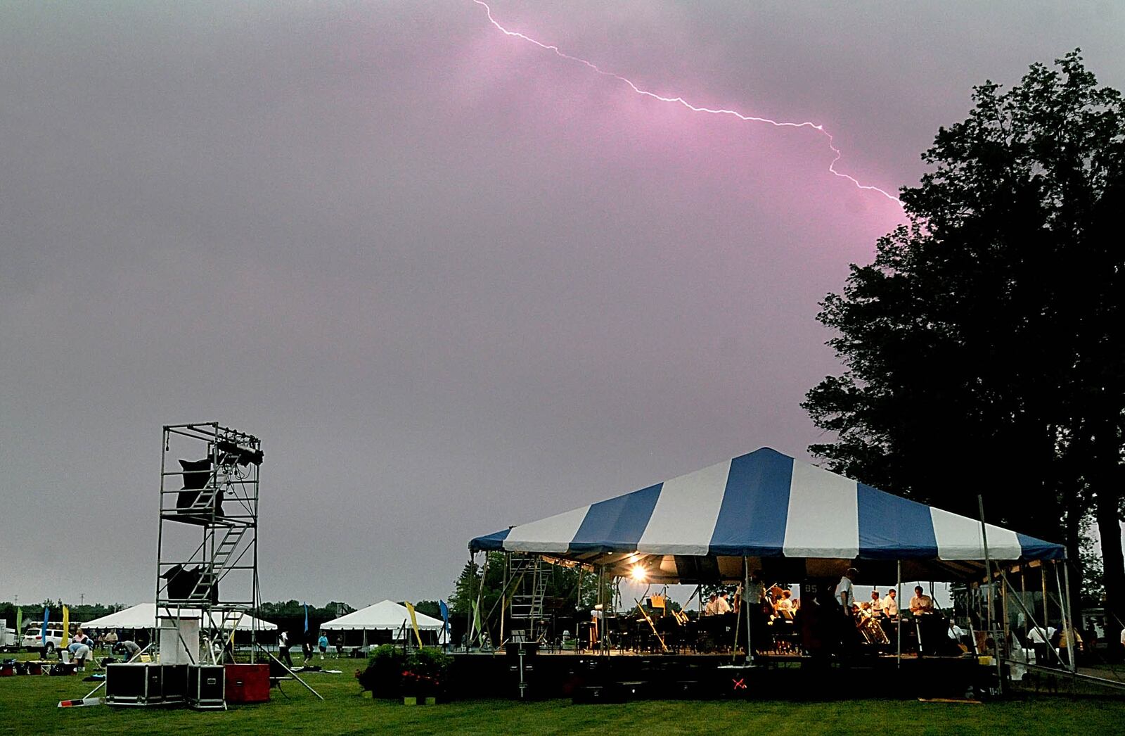 06/16/11: Lightning shoots across the sky over Deerfield Twp.'s Cottell Park prior to the start of a Cincinnati Pops Orchestra concert on Friday, June 10. Thunderstorms forced the cancellation of the event which was sponsored by the Mason-Deerfield Arts Alliance. The Alliance plans to reschedule the concert. Photo by David A. Moodie, contributing photographer