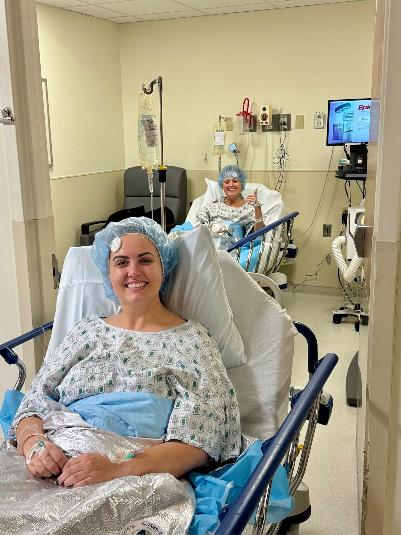 Megan Schultz of Columbus, in front, donated her left kidney to her sorority sister Jessica Hause of Franklin on Dec. 13, 2024, at Christ Hospital in Cincinnati. Hause at 36 was diagnosed with end stage renal disease and immediately had to go on dialysis. CONTRIBUTED
