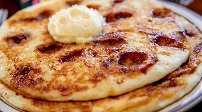 The Lucky Steer restaurant, 1381 Bellefontaine St., is serving âCinnaMoon Pancakesâ with cinnamon craters, sugary glaze and cream cheese topping. CONTRIBUTED PHOTO