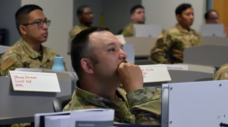 Air Force Staff Sgt. Jesse Burton, a student at the Air Force Institute of Technology’s Civil Engineer School, attends the Air Force Institute of Technology’s Civil Engineer School's Advanced Control Systems Cybersecurity course on Wright-Patterson Air Force Base. Air Force photo by Katie Scott