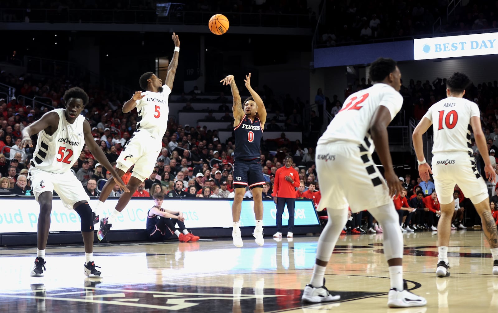 Dayton's Javon Bennett shoots against Cincinnati on Tuesday, Nov. 11, 2025, at Fifth Third Arena in Cincinnati. David Jablonski/Staff
