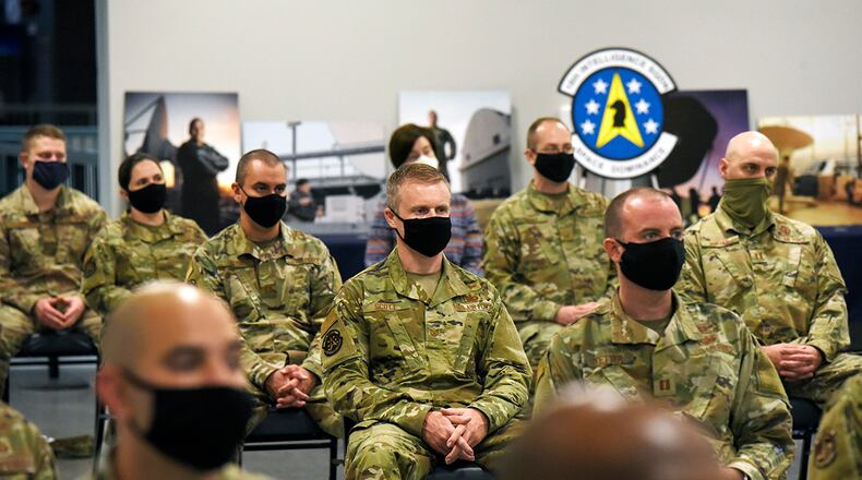 U.S. Air Force personnel with the 18th Intelligence Squadron await deactivation of their squadron and activation of the 73rd Intelligence, Surveillance and Reconnaissance Squadron under the command of Lt. Col. Nathaniel A. Peace, U.S. Space Force Sept. 3. (U.S. Air Force photo/Ty Greenlees)
