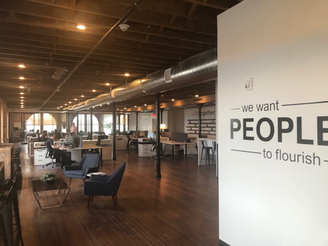 PHOTOS: Inside the new downtown Dayton office that has an industrial slide