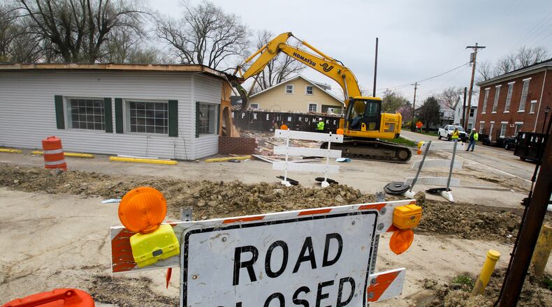 The old Mom's Restaurant in Red Lion, was razed Tuesday, April 16, 2013. Mom moved the business down to the Ohio 123-Ohio 75 interchange after ODOT took her building and property as part of a road relocation, clearing the way for the development of more than 400 surrounding acres. GREG LYNCH / STAFF