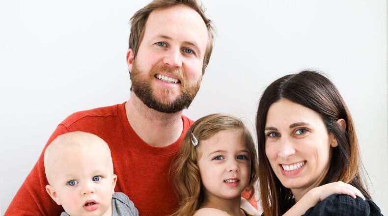 Carl (back L) and Liz Seiley met while working at Young's Jersey Dairy in college. The couple developed a passion for hospitality and events and are announcing the opening of their second event venue - Retreat 21. They are shown with children Archie (L) and Lucy.