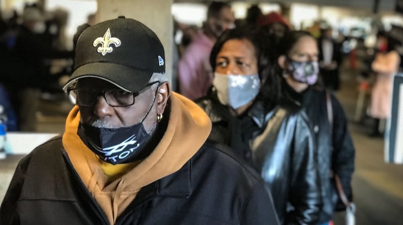 Lawrence Whatley, from Dayton, waits in line on the last day of early voting at the Montgomery County Board of Elections..