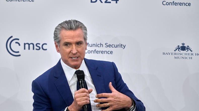 Governor of the State of California, Gavin Newsom speaks during a session at the Munich Security Conference in Munich, Germany, Friday, Feb. 13, 2026. (AP Photo/Michael Probst)