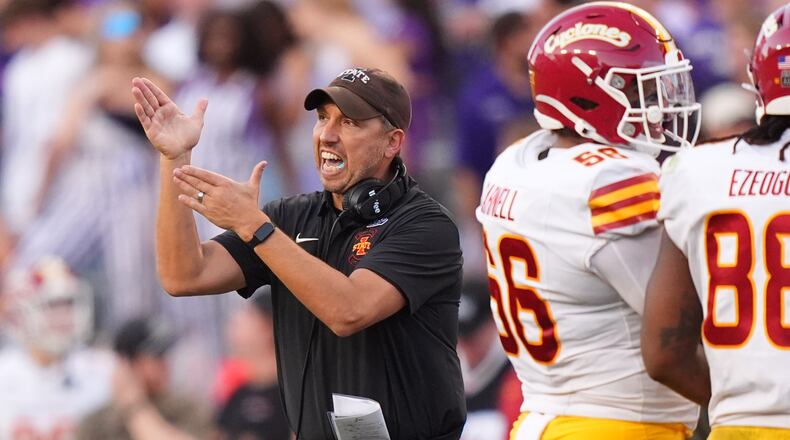 Iowa State head coach Matt Campbell, left, yells from the sidelines during the second half of an NCAA college football game against TCU, Saturday, Nov. 8, 2025, in Fort Worth, Texas. (AP Photo/LM Otero)