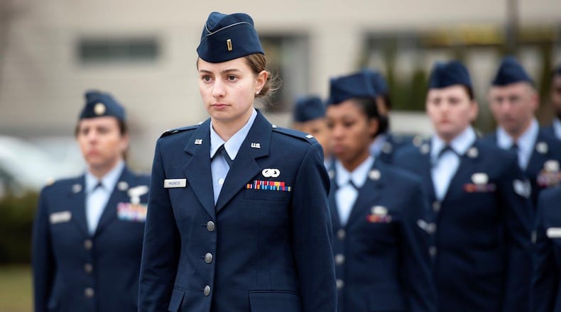 2nd Lt. Rebekah Magness, 88th Security Forces Squadron section commander, leads the flight during the first women-lead retreat at Wright-Patterson Air Force Base March 2. It is the flight commander’s duty to give commands, such as when to salute and when to order arms during the ceremony and to dismiss them when it is completed. (U.S. Air Force photo/Senior Airman Emily Rupert)