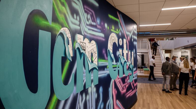 AES held a ribbon cutting on it's newly renovated, Smart Operations Center, Monday October 25, 2021. AES spent $20 million to renovate the old Dayton Power & Light building and move AES into the future. JIM NOELKER/STAFF