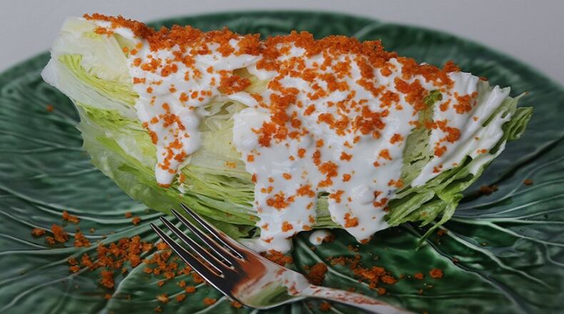 A wedge of salad with blue cheese dressing and riplets. (J.B. Forbes/St. Louis Post-Dispatch/TNS)