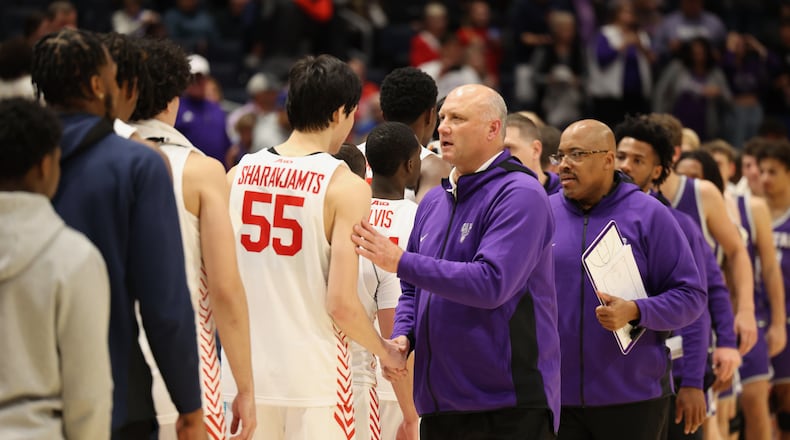 Capital's Damon Goodwin goes through the handshake line after a loss to Dayton in an exhibition game on Saturday, Oct. 29, 2022, at UD Arena. David Jablonski/Staff