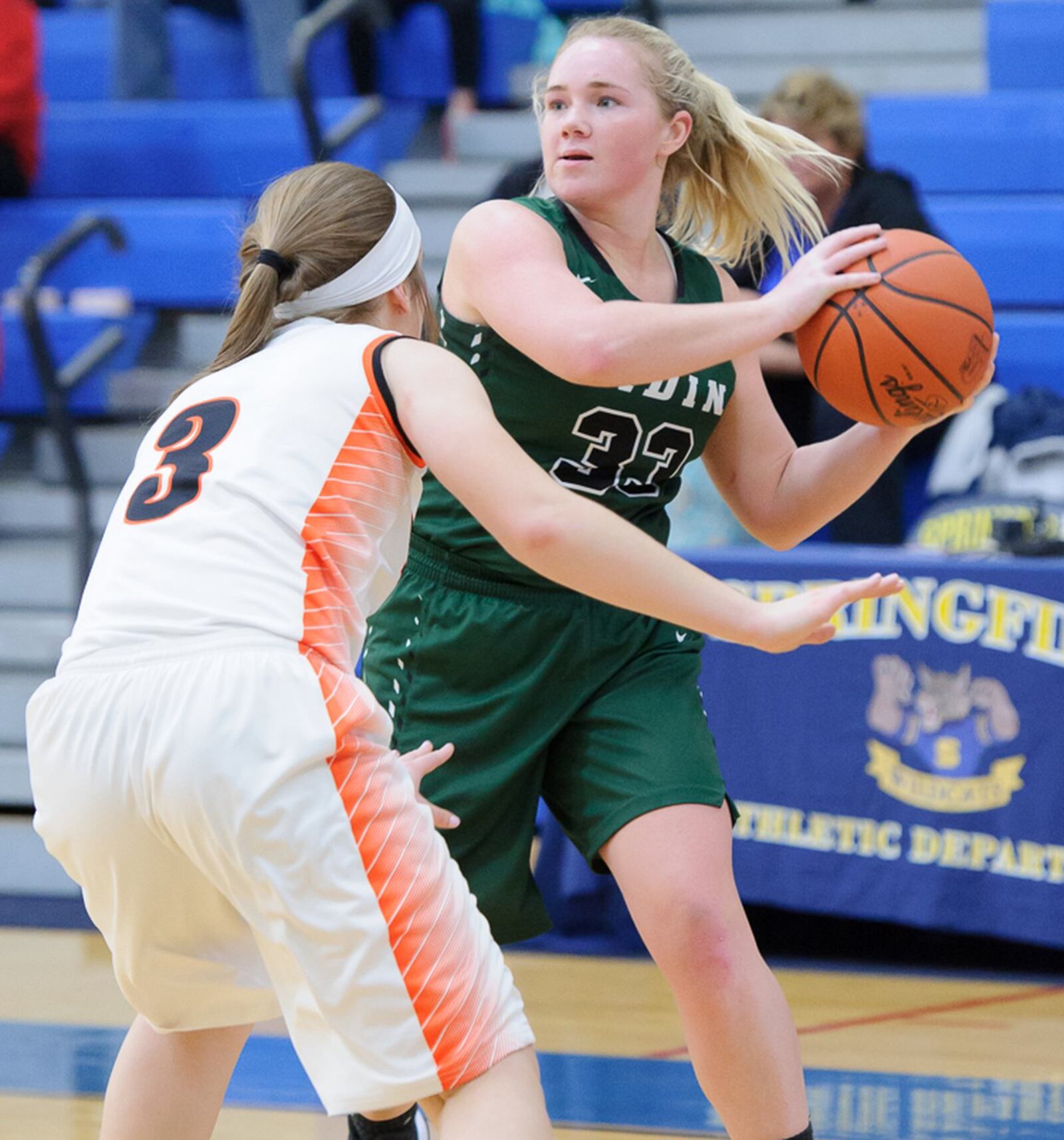 West Liberty-Salem’s Kelsey Day applies defensive pressure to Badin’s Olivia Keene on Saturday during a Division III district final at Springfield. CONTRIBUTED PHOTO BY BRYANT BILLING