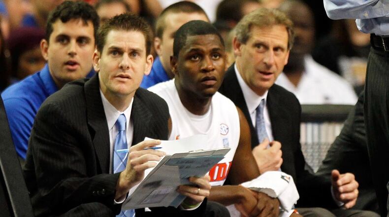 Darren Hertz, left, coaches with Florida during the semifinals of the SEC Men’s Basketball Tournament at Georgia Dome on March 12, 2011 in Atlanta, Georgia. Getty Images