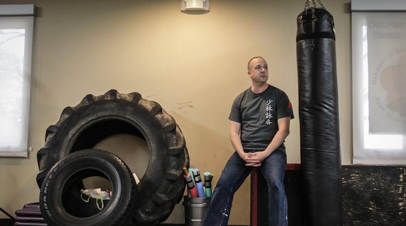 Jeremy Roadruck, owner of Meng’s Martial Arts in Centerville, may have to rebuild his business model because of strict social distancing. JIM NOELKER/STAFF