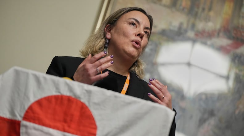 Naaja Nathanielsen, Greenland's Minister for Business, speaks during a press conference in the Houses of Parliament in London, England, Tuesday, Jan. 13, 2026. (AP Photo/Alastair Grant)