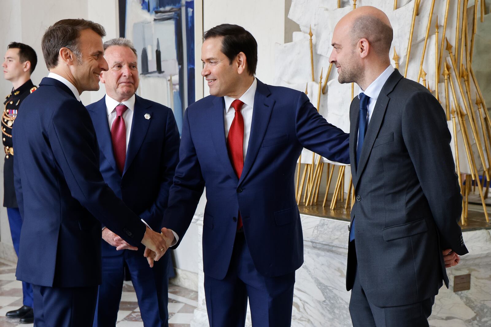 French President Emmanuel Macron, left, welcomes US Secretary of State Marco Rubio, 2nd right, US Special Envoy Steve Witkoff, 2nd left, and France's Minister for Foreign Affairs Jean-Noel Barrot for a meeting at the Elysee Palace in Paris, Thursday April 17, 2025. (Ludovic Marin, Pool Photo via AP)