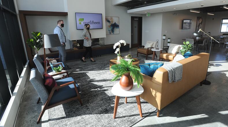 OneFifteen Living, an apartment complex that is part of the addiction treatment and recovery center OneFifteen, celebrated with a ribbon cutting on Friday. The new 26,300-square-foot building has 29 double-occupancy rooms with separate living spaces for men and women, group kitchens, a fitness center, meditation room, coffee bar and rooms for individual and group therapy. Outdoor space is still being developed. “OneFifteen Living will give people a safe place to live while they continue their journey of recovery,” said President and CEO Marti Taylor. MARSHALL GORBY\STAFF