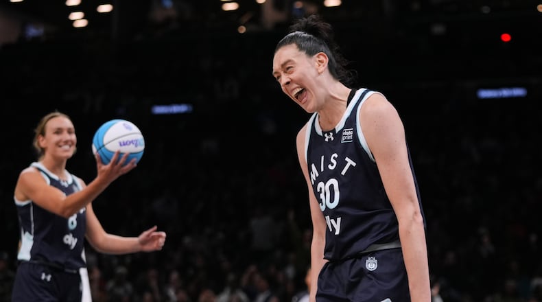 Mist BC wing Breanna Stewart (30) celebrates with teammate Alanna Smith (8) after scoring during the second half of a semifinal in an Unrivaled 3-on-3 basketball game against Breeze BC, Monday, March 2, 2026, in New York. (AP Photo/Frank Franklin II)